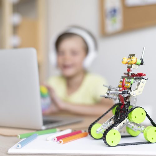 medium-shot-blurry-boy-wearing-headphones